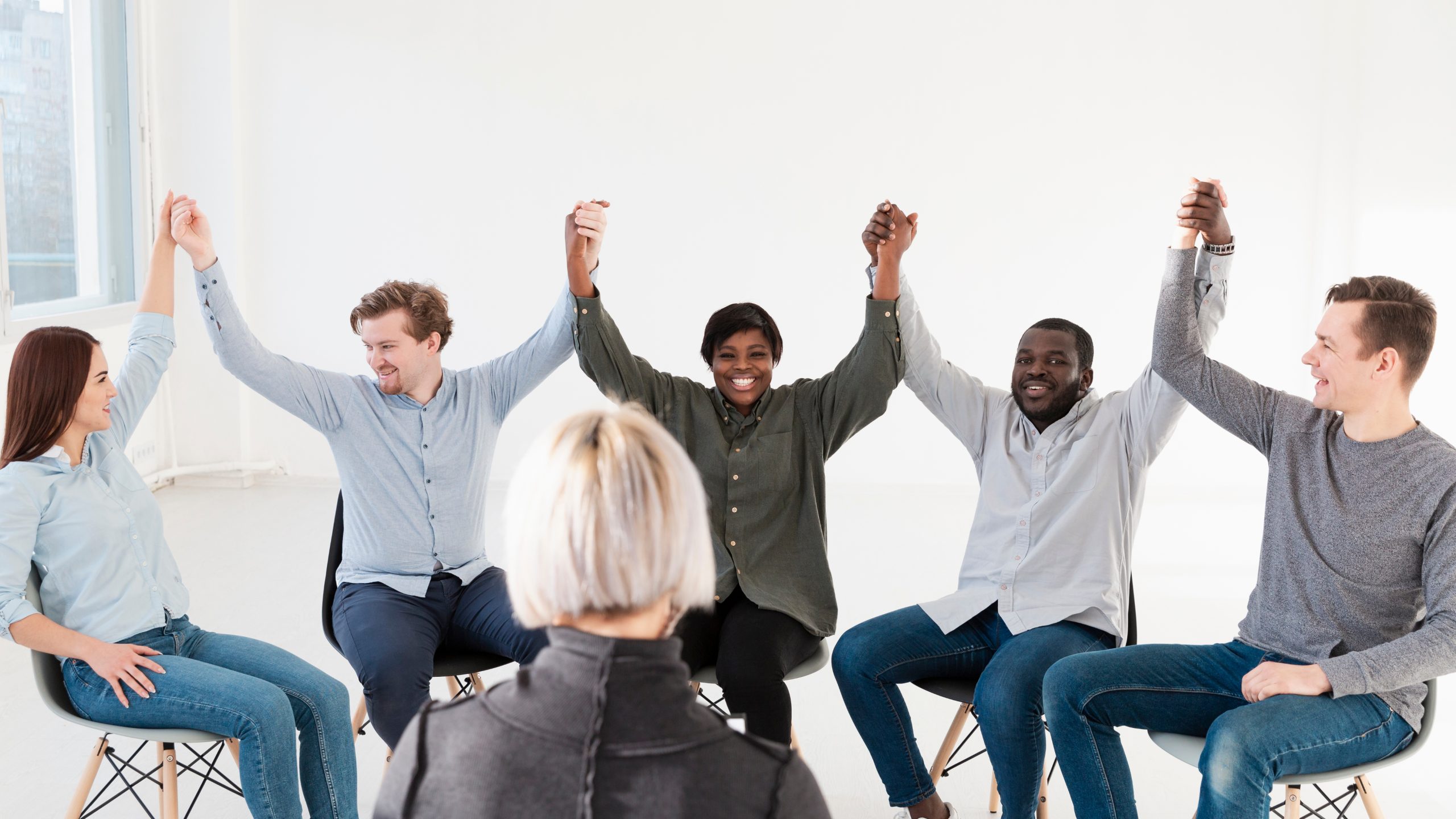 Community members participating in a support group