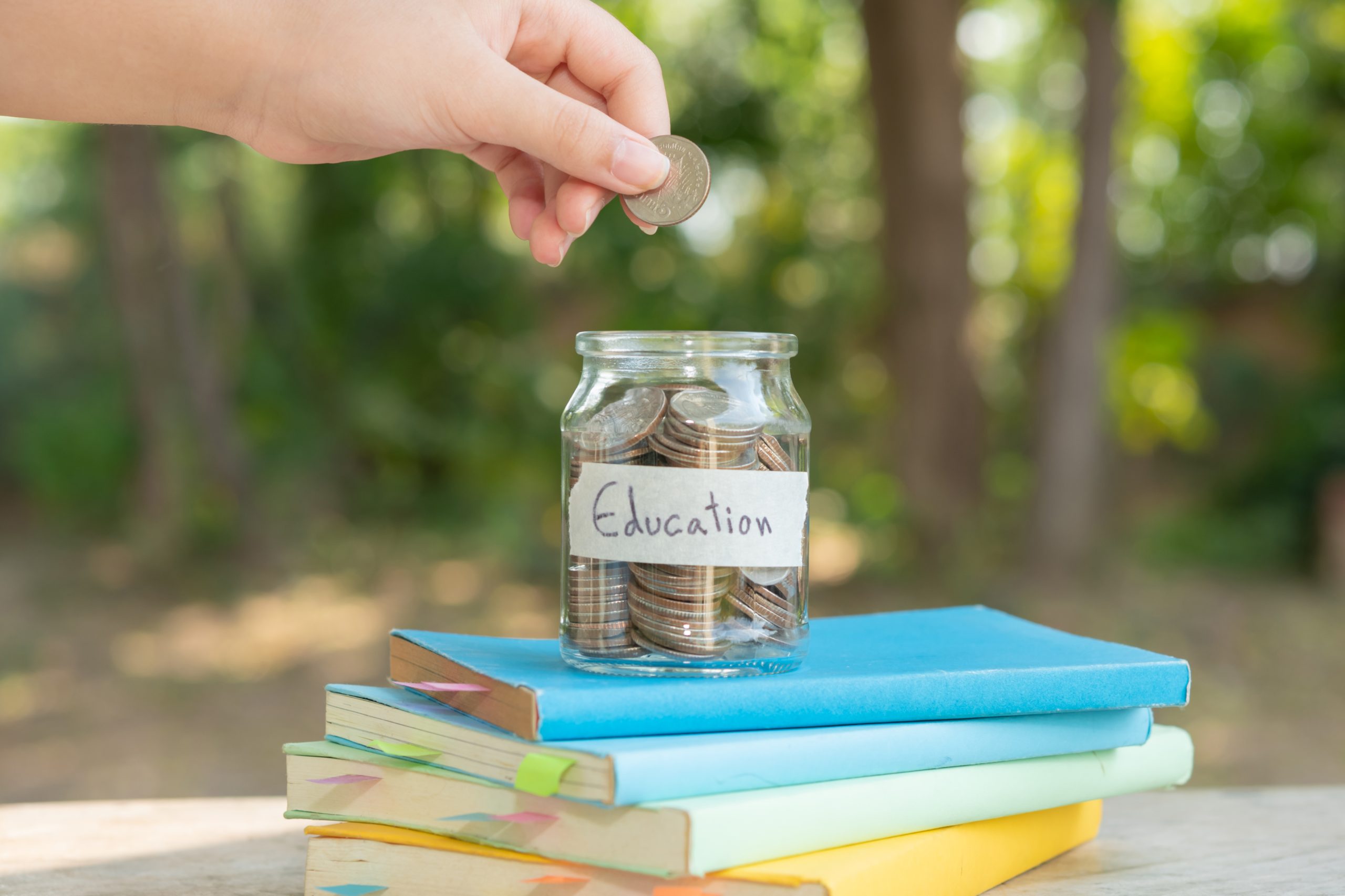 Charitable donation supporting student scholarships through stock and asset giving
